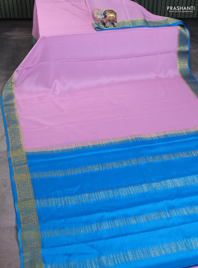 Pure mysore silk saree lotus pink and cs blue with plain body and zari woven border