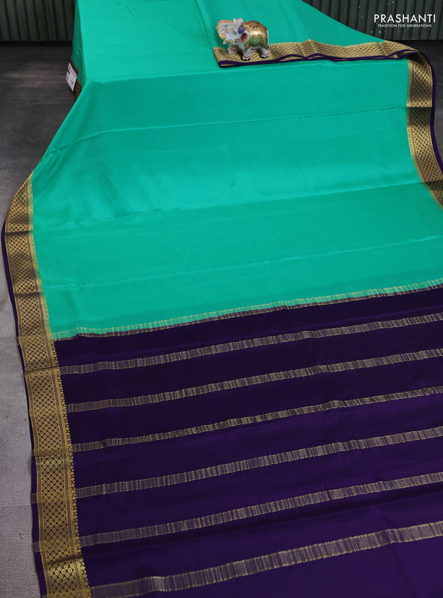 Pure mysore silk saree teal green and violet with plain body and zari woven border