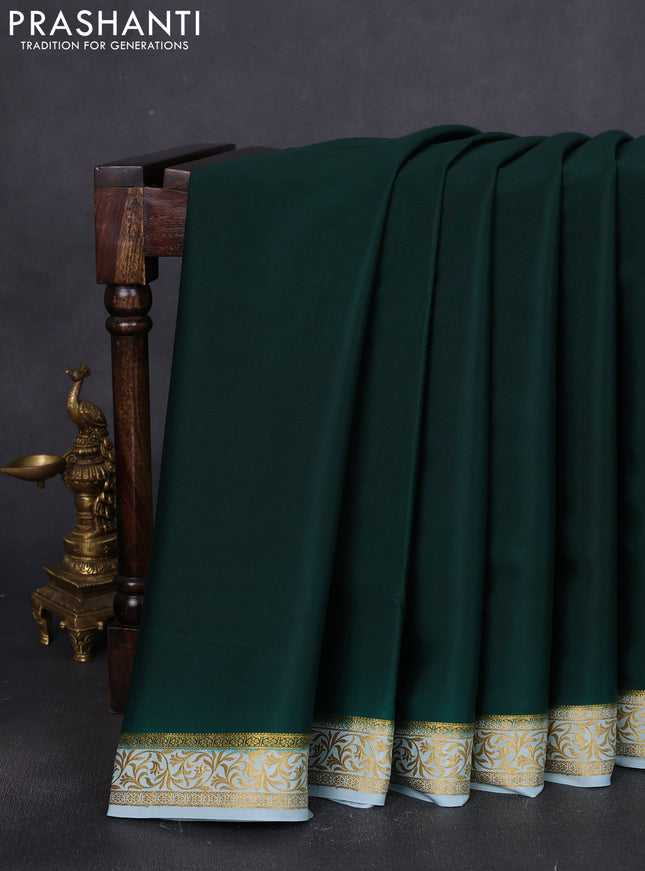 Pure mysore silk saree bottle green and pastel blue with plain body and zari woven border