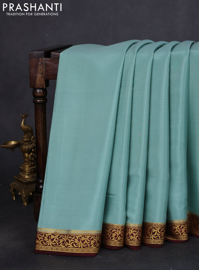 Pure mysore silk saree pastel green and brown with plain body and zari woven border
