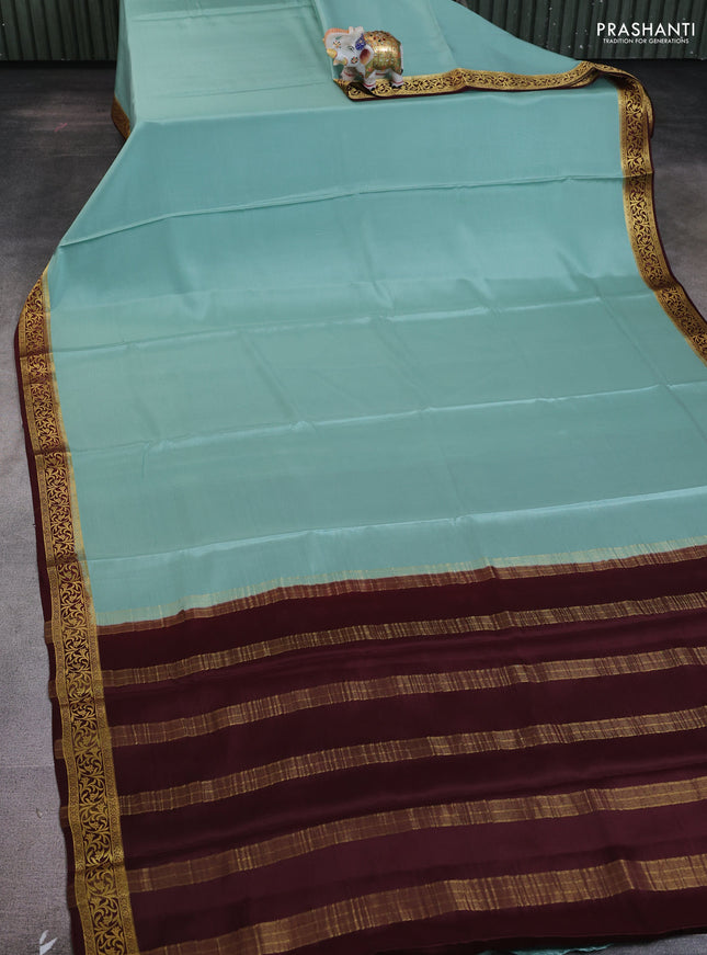 Pure mysore silk saree pastel green and brown with plain body and zari woven border