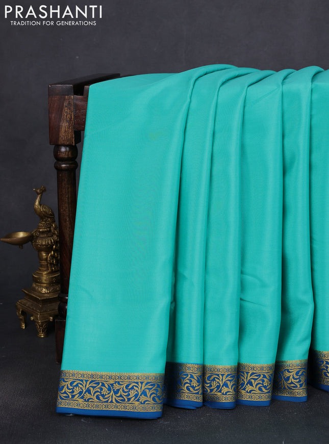 Pure mysore silk saree teal green and peacock blue with plain body and zari woven border