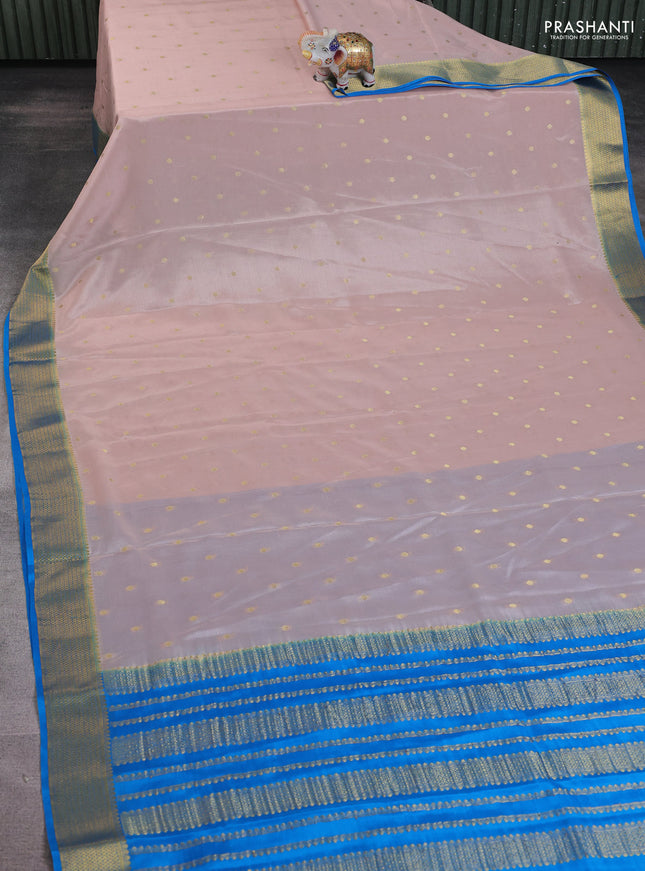 Pure mysore silk saree pastel peach and cs blue with allover zari woven buttas and zari woven border