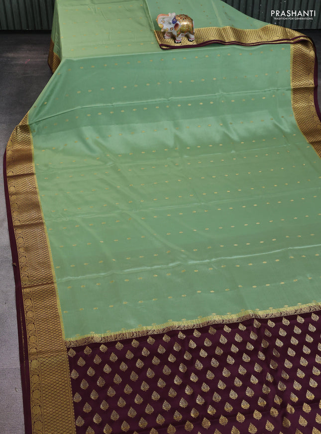 Pure mysore silk saree pista green and coffee brown with allover zari woven buttas and zari woven border