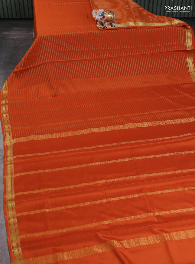 Pure mysore silk saree rustic orange with allover zari weaves and zari woven border