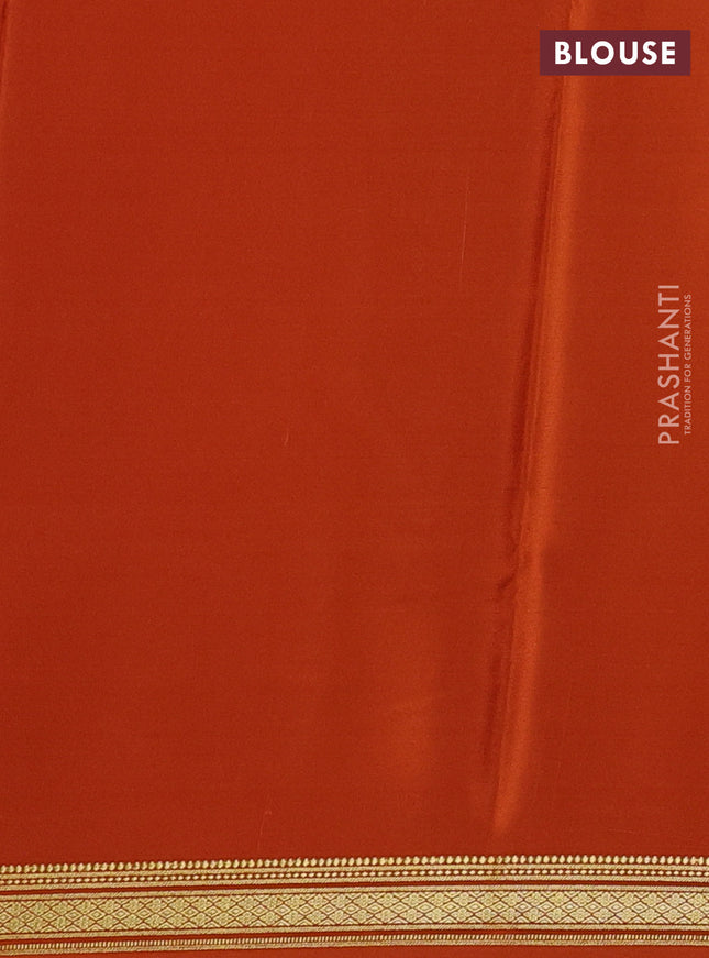 Pure mysore silk saree rustic orange with allover zari weaves and zari woven border