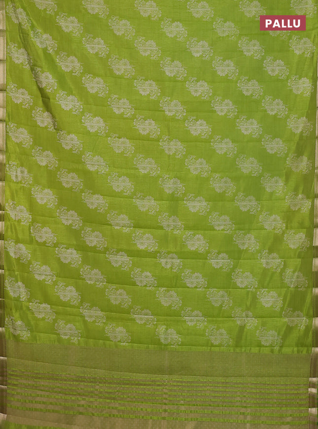 Semi raw silk saree fluorescent green with butta prints and zari woven border
