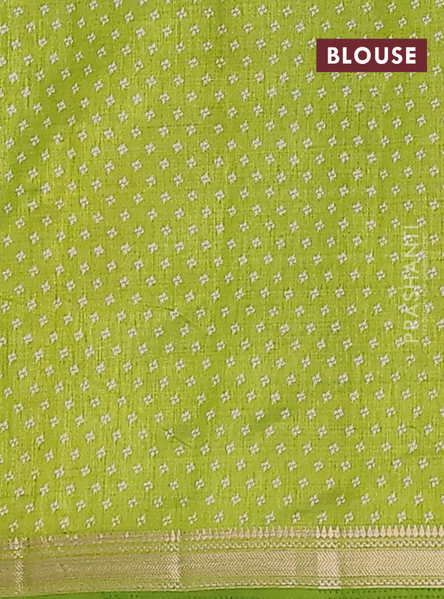 Semi raw silk saree fluorescent green with butta prints and zari woven border
