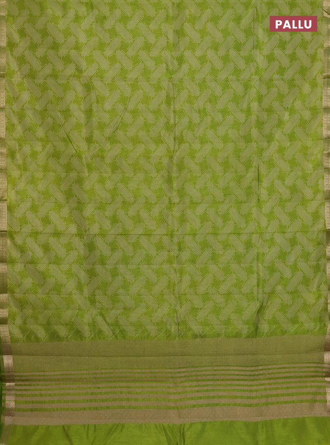 Semi raw silk saree light green with allover geometric prints and zari woven border