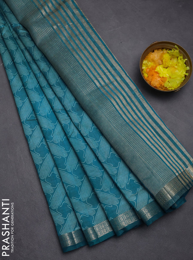 Semi raw silk saree cs blue with allover geometric prints and zari woven border