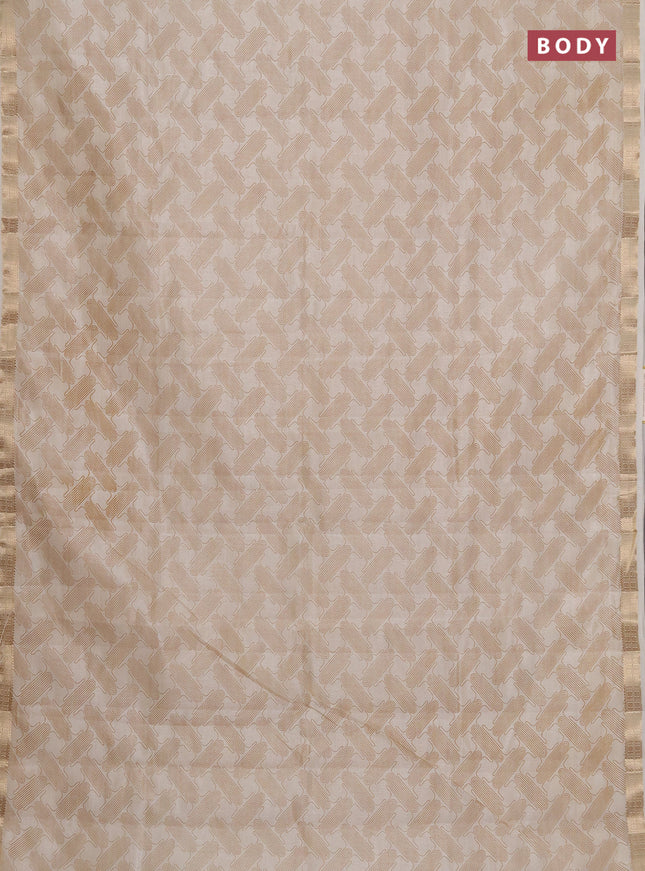 Semi raw silk saree cream with allover geometric prints and zari woven border