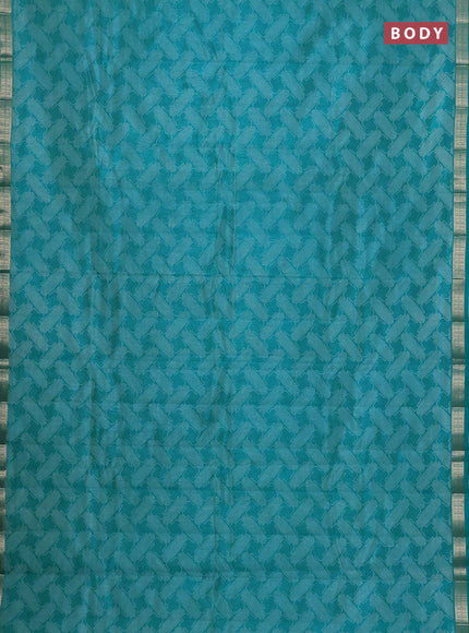 Semi raw silk saree teal blue with allover geometric prints and zari woven border