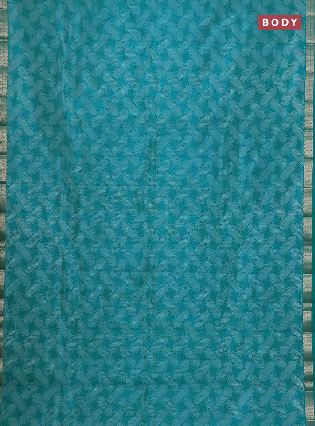 Semi raw silk saree teal blue with allover geometric prints and zari woven border