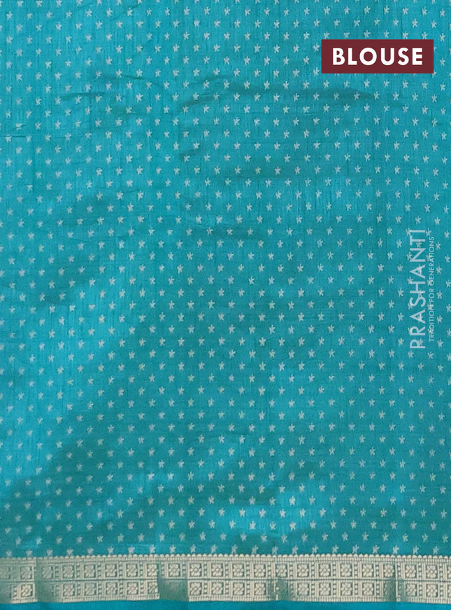 Semi raw silk saree teal blue with allover geometric prints and zari woven border