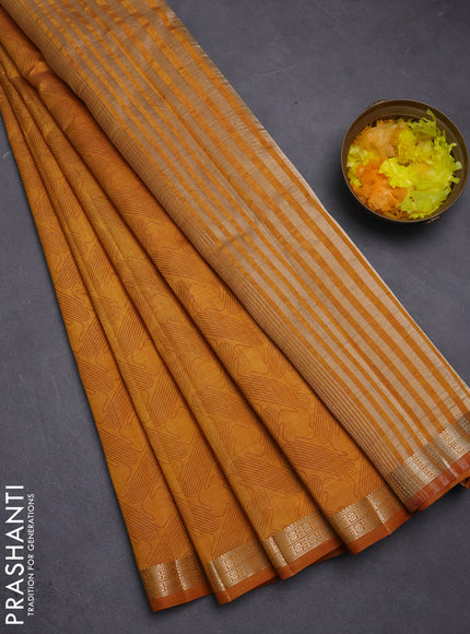 Semi raw silk saree mustard yellow with allover geometric prints and zari woven border