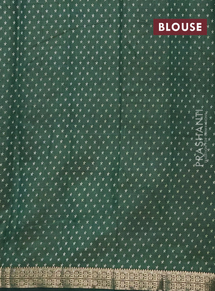 Semi raw silk saree green with allover geometric prints and zari woven border