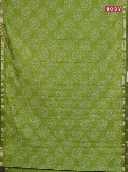 Semi raw silk saree light green with allover geometric butta prints and zari woven border