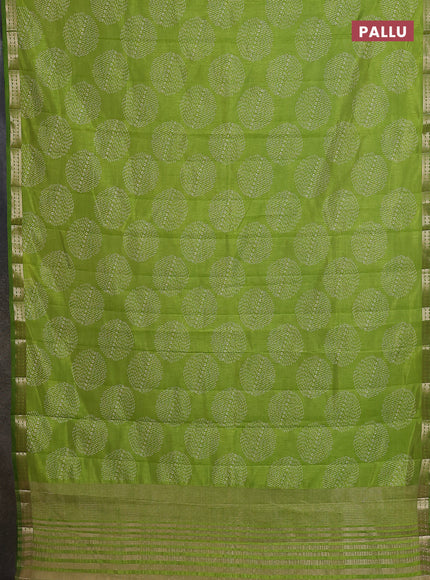 Semi raw silk saree light green with allover geometric butta prints and zari woven border
