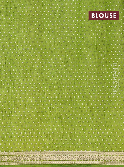 Semi raw silk saree light green with allover geometric butta prints and zari woven border