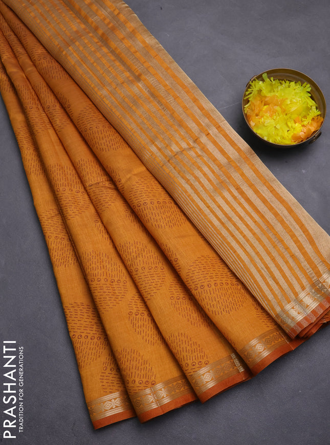 Semi raw silk saree mustard yellow with allover geometric butta prints and zari woven border
