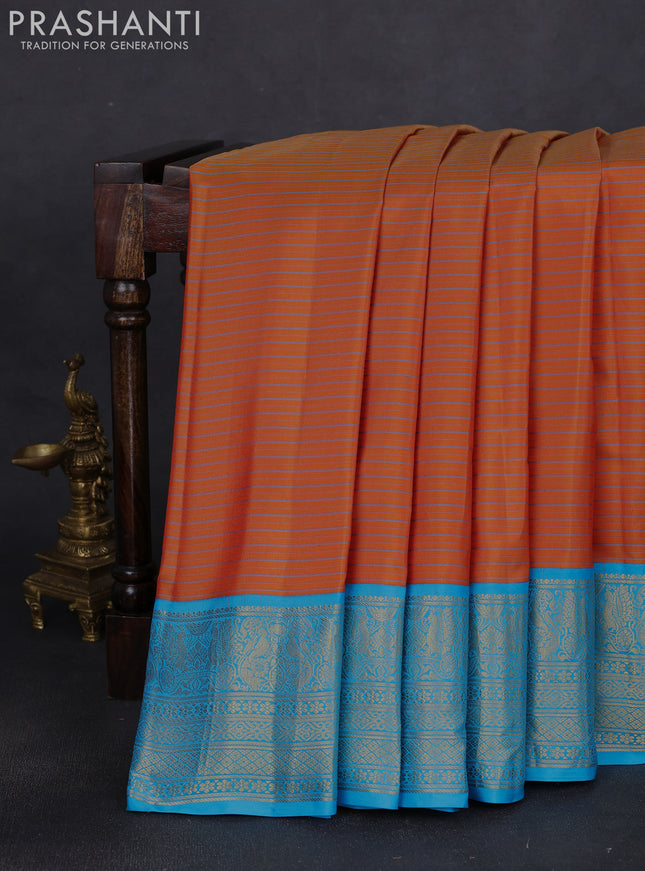 Pure gadwal silk saree rustic orange and blue with allover stripe pattern and rich zari woven border