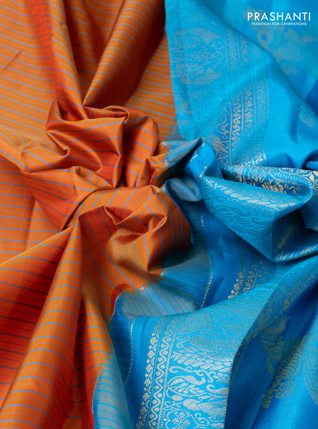 Pure gadwal silk saree rustic orange and blue with allover stripe pattern and rich zari woven border