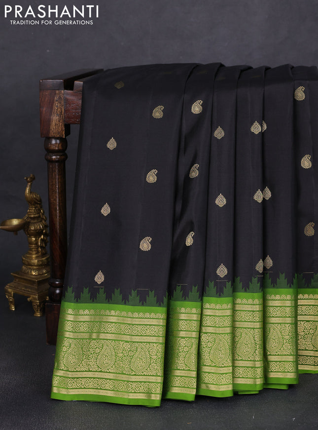 Pure gadwal silk saree black and mehendi green with zari woven buttas and temple design paisley zari woven border