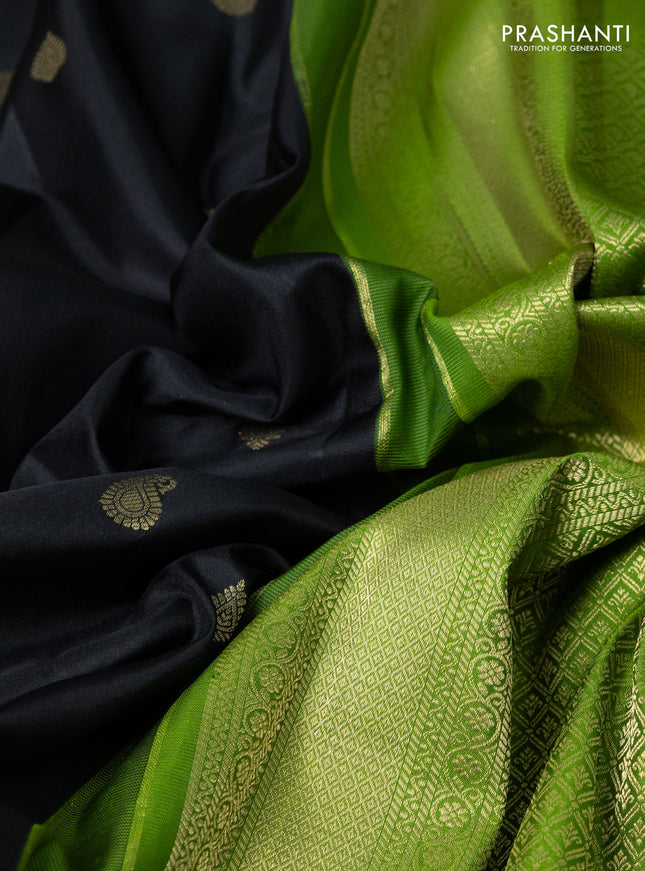 Pure gadwal silk saree black and mehendi green with zari woven buttas and temple design paisley zari woven border