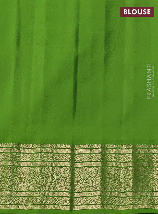 Pure gadwal silk saree black and mehendi green with zari woven buttas and temple design paisley zari woven border