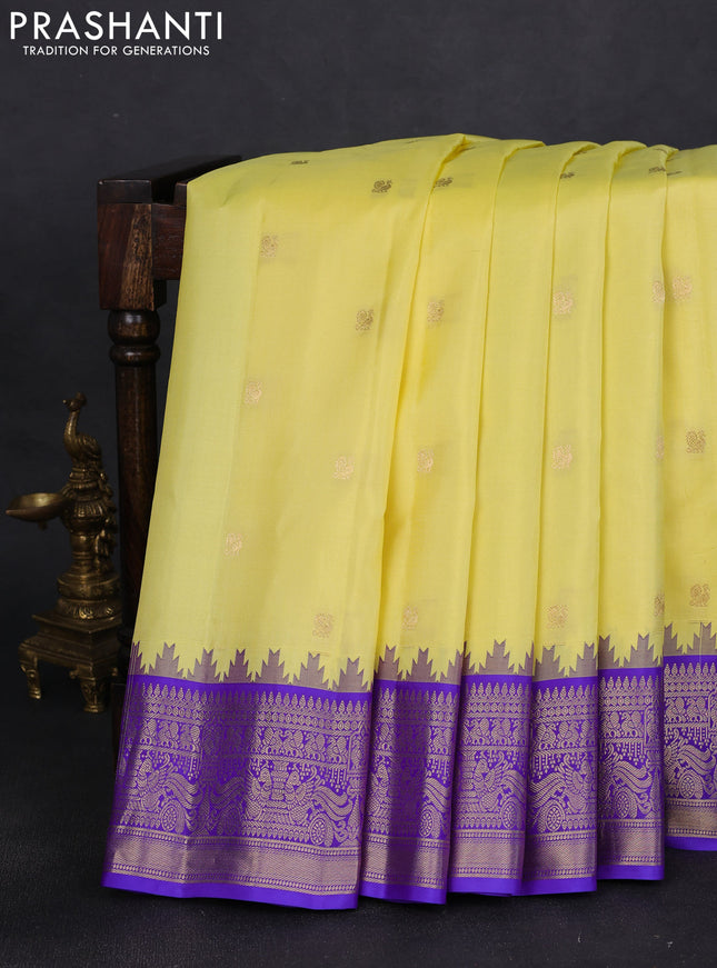Pure gadwal silk saree lime yellow and violet with zari woven buttas and temple design zari woven border