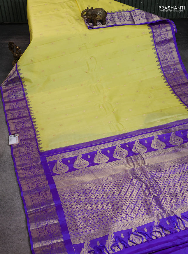 Pure gadwal silk saree lime yellow and violet with zari woven buttas and temple design zari woven border