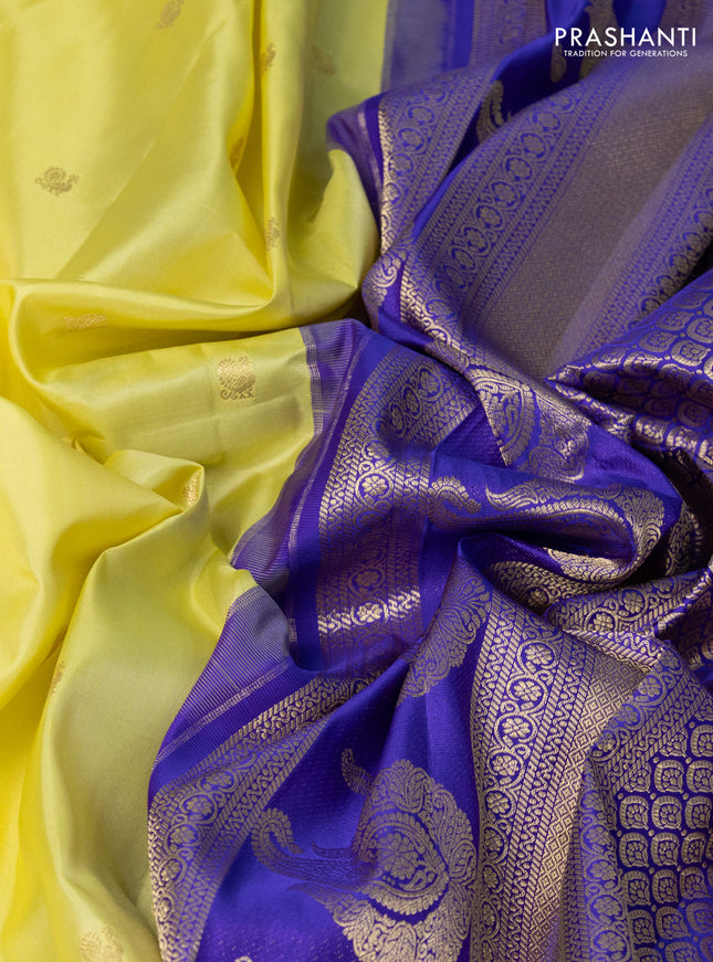 Pure gadwal silk saree lime yellow and violet with zari woven buttas and temple design zari woven border