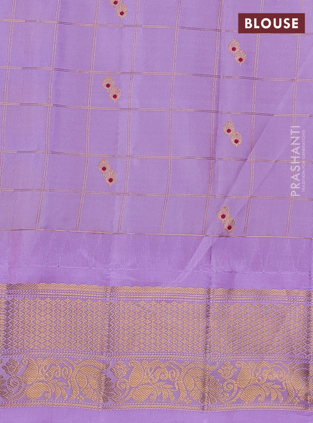 Pure gadwal silk saree purple and lavender with allover zari checks & buttas and temple design zari woven border