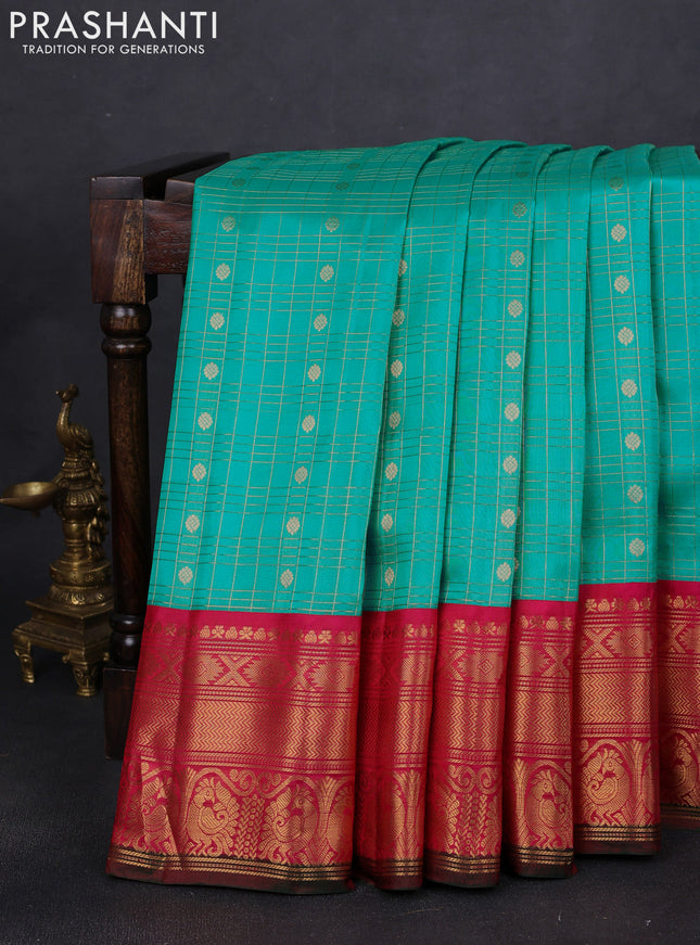 Pure gadwal silk saree teal blue and pink with allover zari checks & buttas and long zari woven border