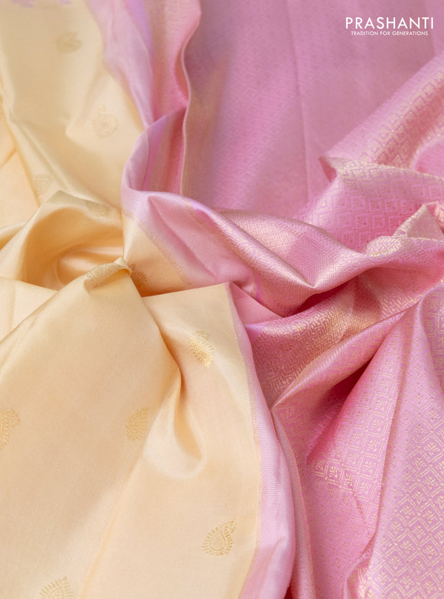 Pure gadwal silk saree cream and light pink with zari woven buttas and temple design paisley zari woven border