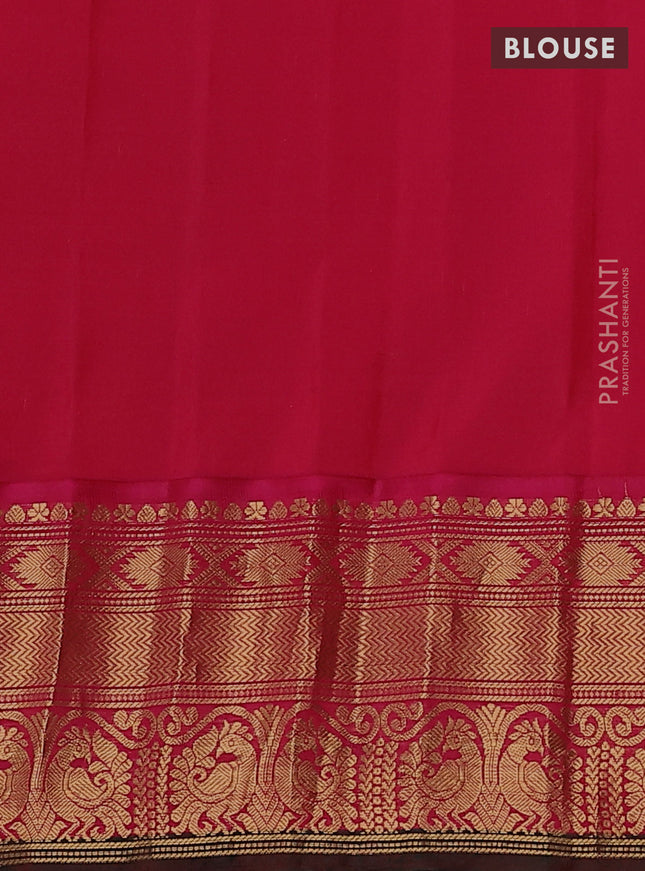 Pure gadwal silk saree dual shade of bluish green and pink with allover zari checks & buttas and long rich zari woven border
