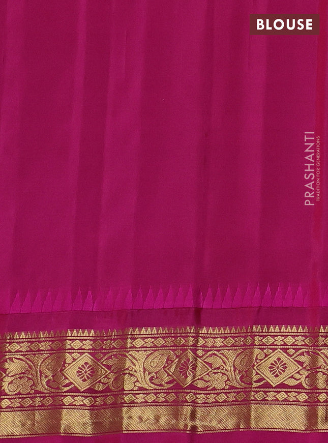 Pure gadwal silk saree dual shade of blue and pink with allover zari checks & buttas and long temple design zari woven border