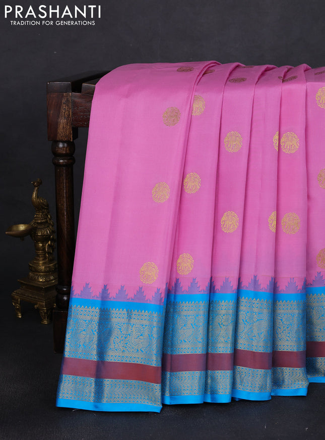 Pure gadwal silk saree lotus pink and cs blue with zari woven buttas and long temple design zari woven border