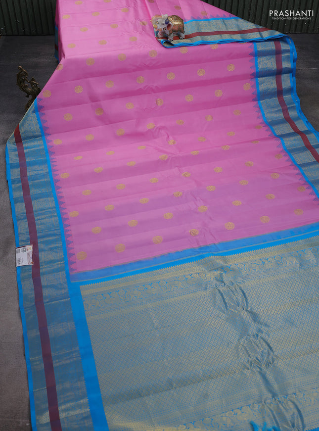 Pure gadwal silk saree lotus pink and cs blue with zari woven buttas and long temple design zari woven border