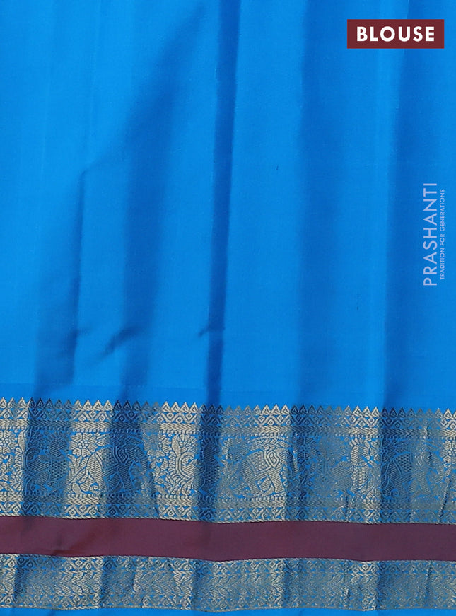 Pure gadwal silk saree lotus pink and cs blue with zari woven buttas and long temple design zari woven border