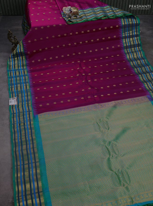 Pure gadwal silk saree dark magenta pink and teal green with annam zari woven buttas and temple design zari woven border