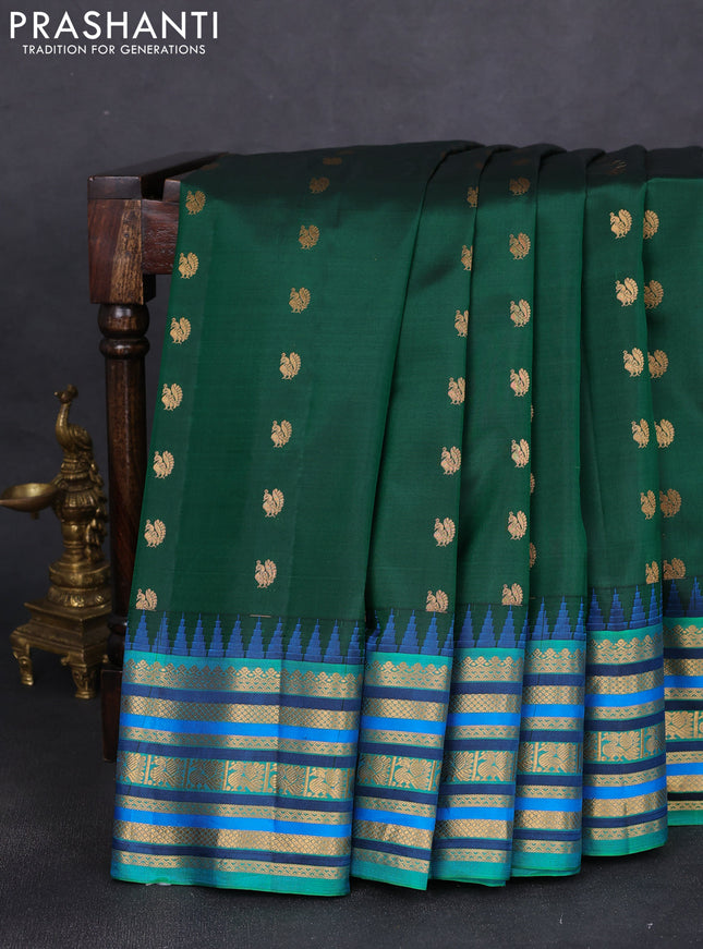 Pure gadwal silk saree green and teal green with annam zari woven buttas and temple design zari woven border