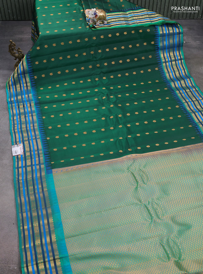 Pure gadwal silk saree green and teal green with annam zari woven buttas and temple design zari woven border