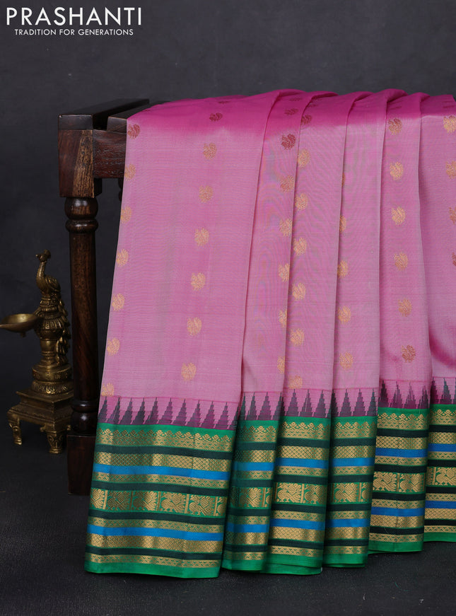 Pure gadwal silk saree pink shade and green with annam zari woven buttas and temple design zari woven border