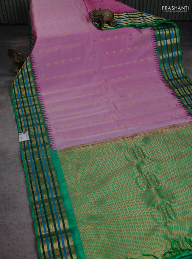 Pure gadwal silk saree pink shade and green with annam zari woven buttas and temple design zari woven border