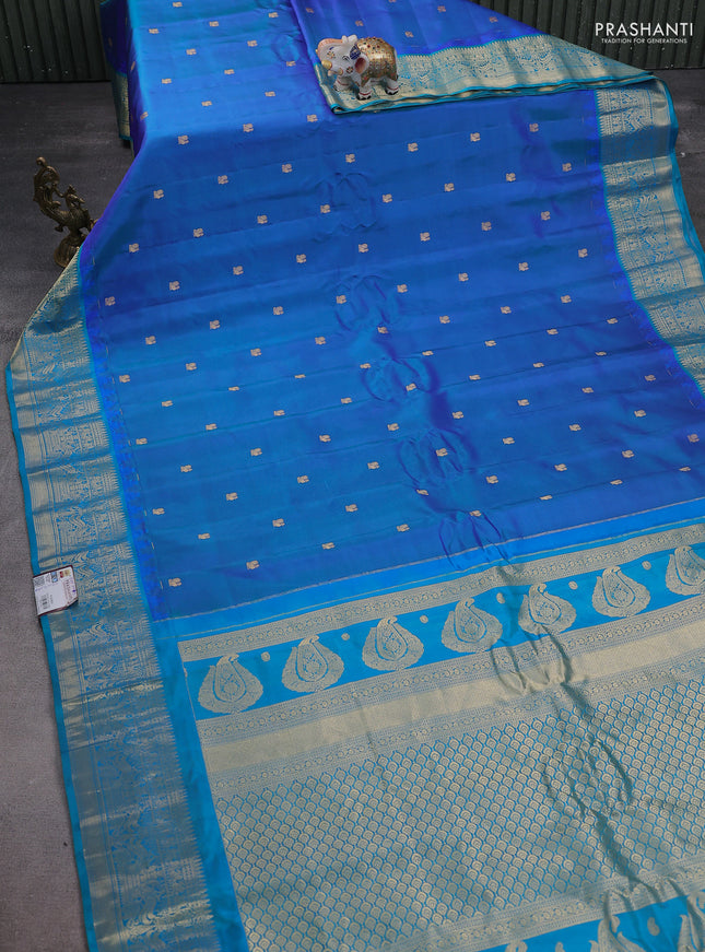 Pure gadwal silk saree dual shade of blue and teal blue with annam zari woven buttas and temple design zari woven border
