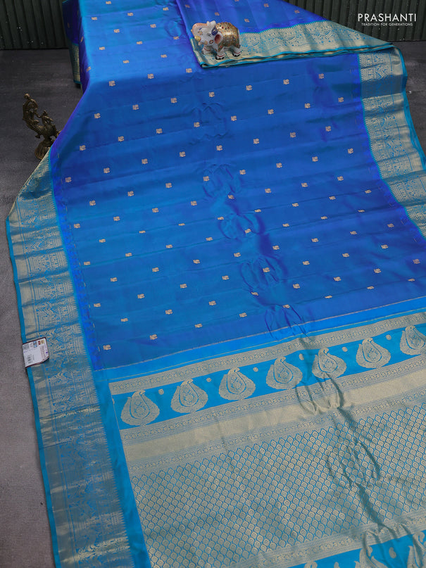 Pure gadwal silk saree dual shade of blue and teal blue with annam zari woven buttas and temple design zari woven border