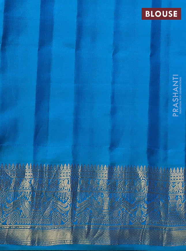 Pure gadwal silk saree dual shade of blue and teal blue with annam zari woven buttas and temple design zari woven border