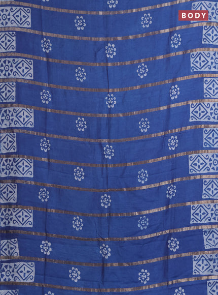 Semi chanderi saree blue with allover zari strips & batik butta prints in borderless style