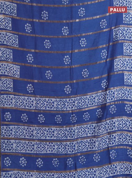 Semi chanderi saree blue with allover zari strips & batik butta prints in borderless style